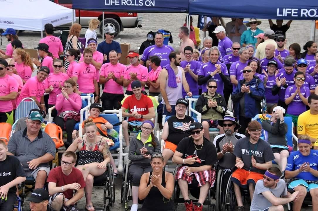 Life Rolls On — community members in team shirts