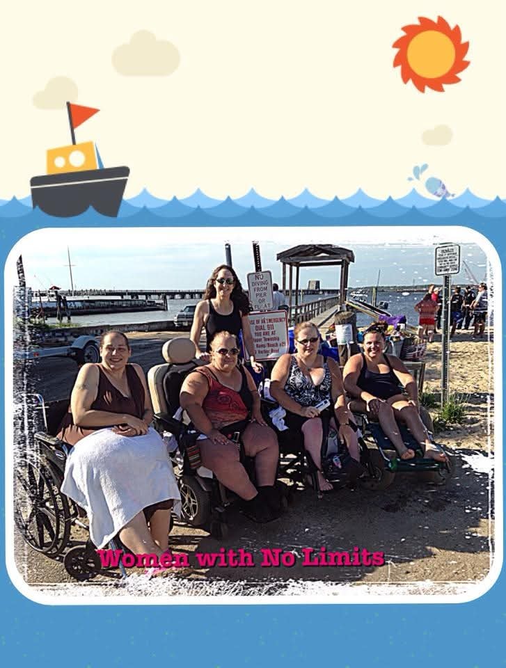 Women with No Limits — beach pier group photo