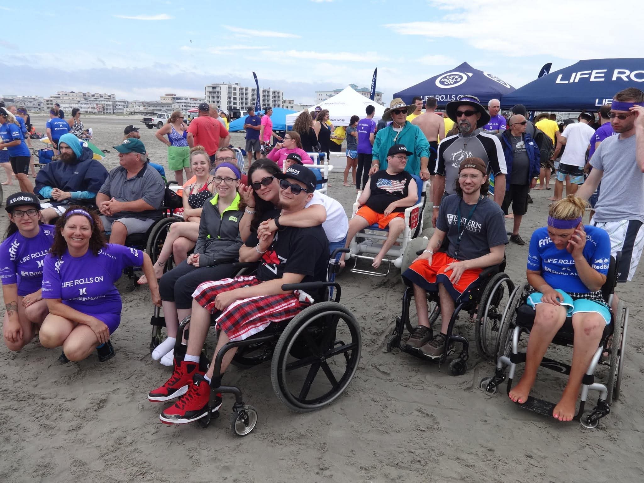 Life Rolls On — large community beach gathering