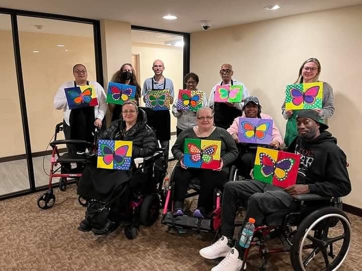 Community group displaying butterfly artwork