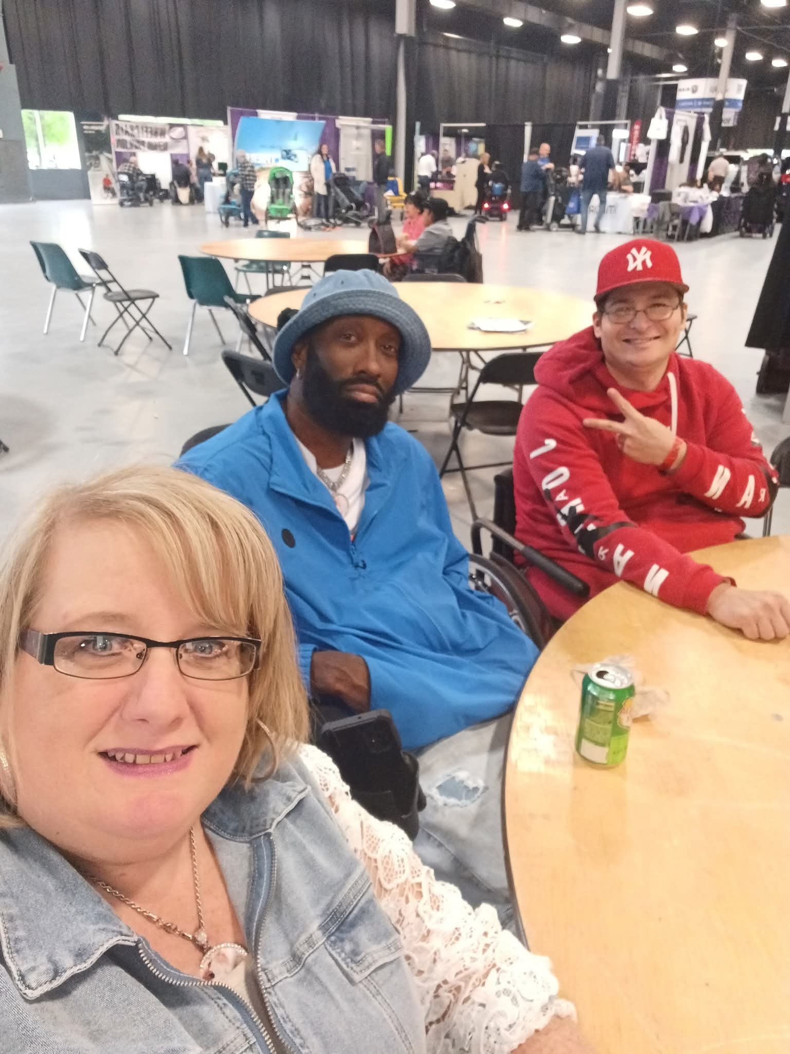 Three members at community convention