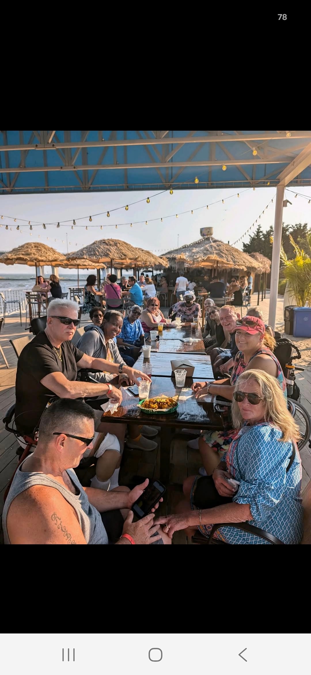 Community dining at beachside venue