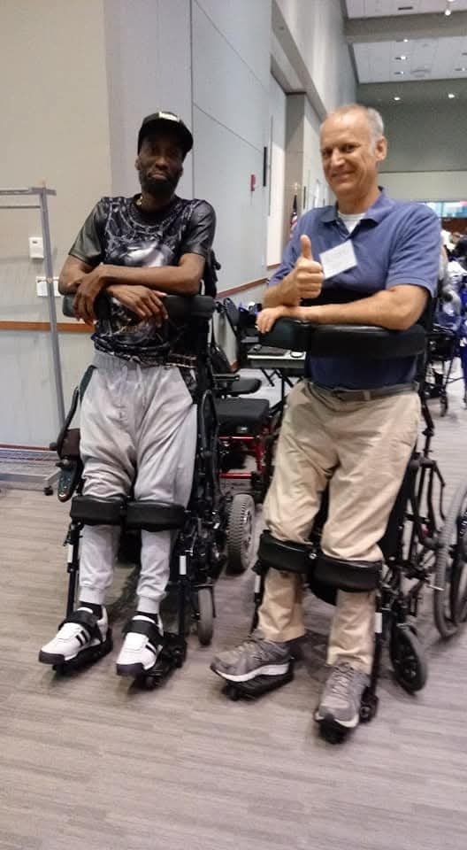 Two members at adaptive mobility expo